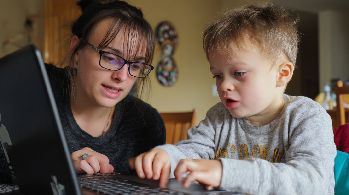 Basic Tech Empowering Seniors in Today’s Digital World A Photo Of A Young Woman Helping A Young Boy With 129e076e B585 4e6f 982b Cbfbe30cb377